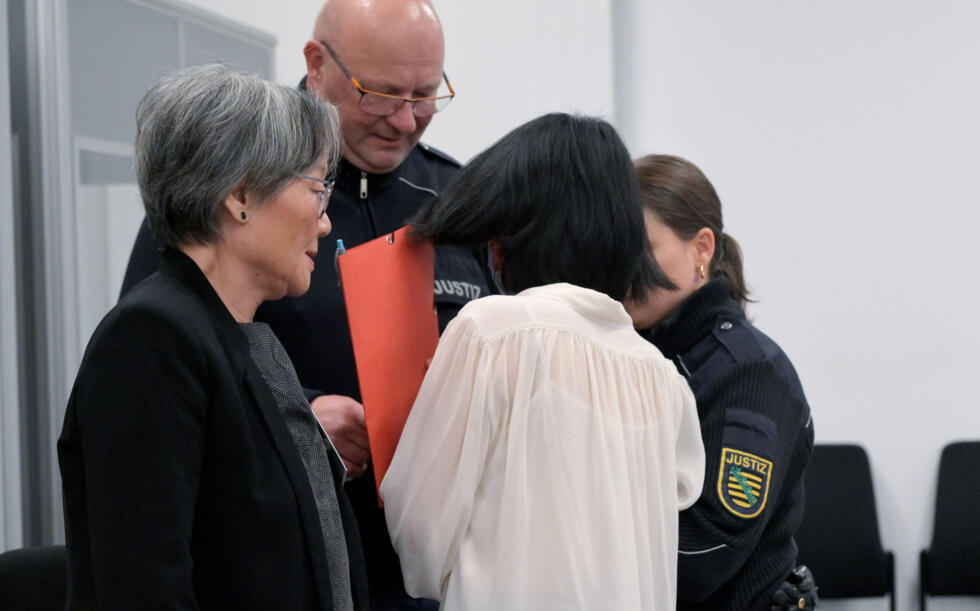 Defendant Yaqi X., seen from the back, at the start of the espionage trial in Dresden, eastern Germany.