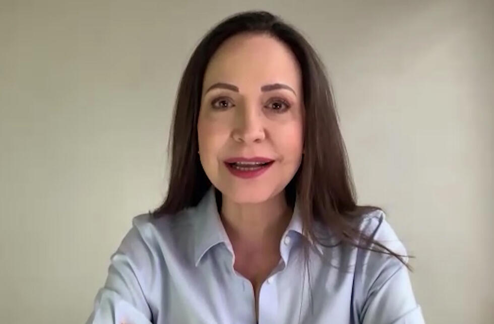 Une capture d'écran montrant la cheffe de l'opposition vénézuélienne Maria Corina Machado lors d'une interview de l'AFP via Zoom à Caracas le 15 mai 2025