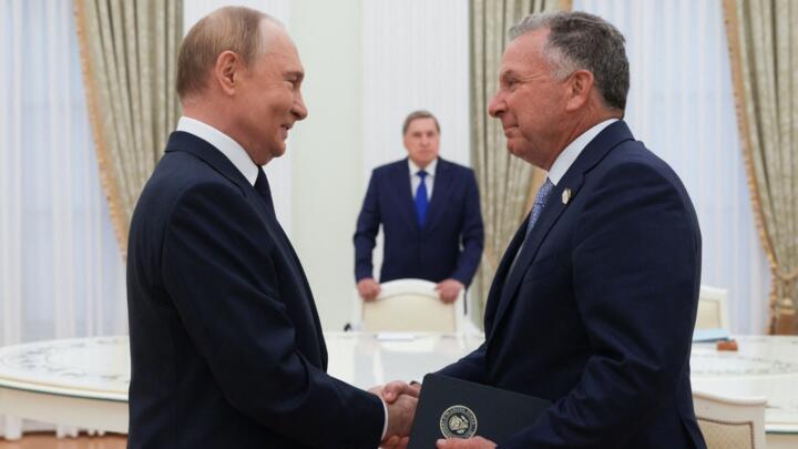 Russia's President Vladimir Putin greets US Special Envoy Steve Witkoff prior to their talks in Moscow on August 6, 2025.