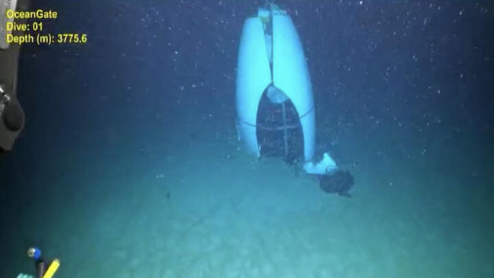 In this June 22, 2023, image obtained from the US Coast Guard and Pelagic Research Services, the tail cone of the Titan submersible rests at the bottom of the ocean.