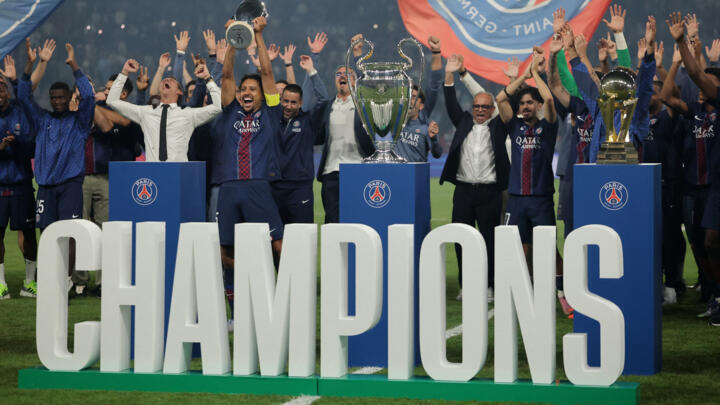 PSG players present the five cups the team won last season, after the League One Paris Saint-Germain match against Angers at the Parc des Princes stadium on Friday, August 22, 2025 in Paris.