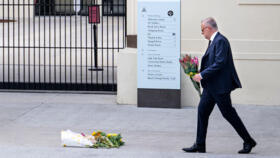Australia's Prime Minister Anthony Albanese lays flowers at the Bondi Pavillion in Sydney after a mass shooting.