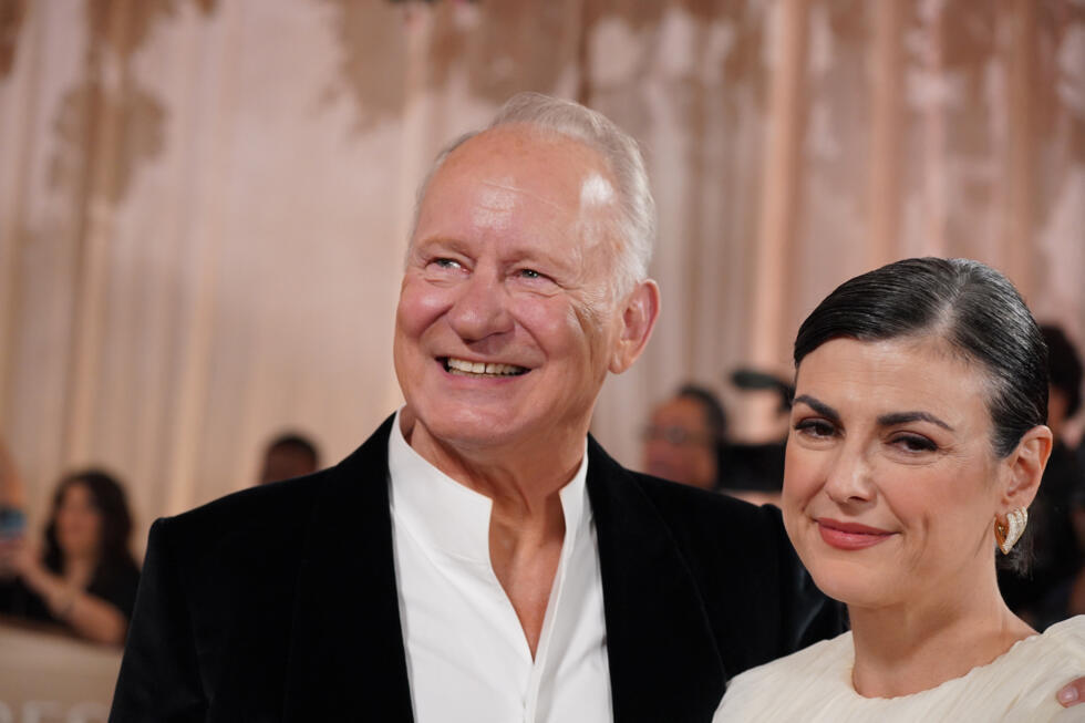 Stellan SkarsgÃ¥rd, left, and Megan Everett-Skarsgard arrive at the 83rd Golden Globes on Sunday, Jan. 11, 2026