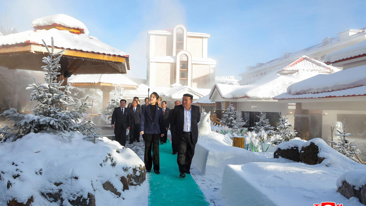 North Korean leader Kim Jong Un (R) and his daughter Ju Ae (L) inspecting the Milyong Hotel