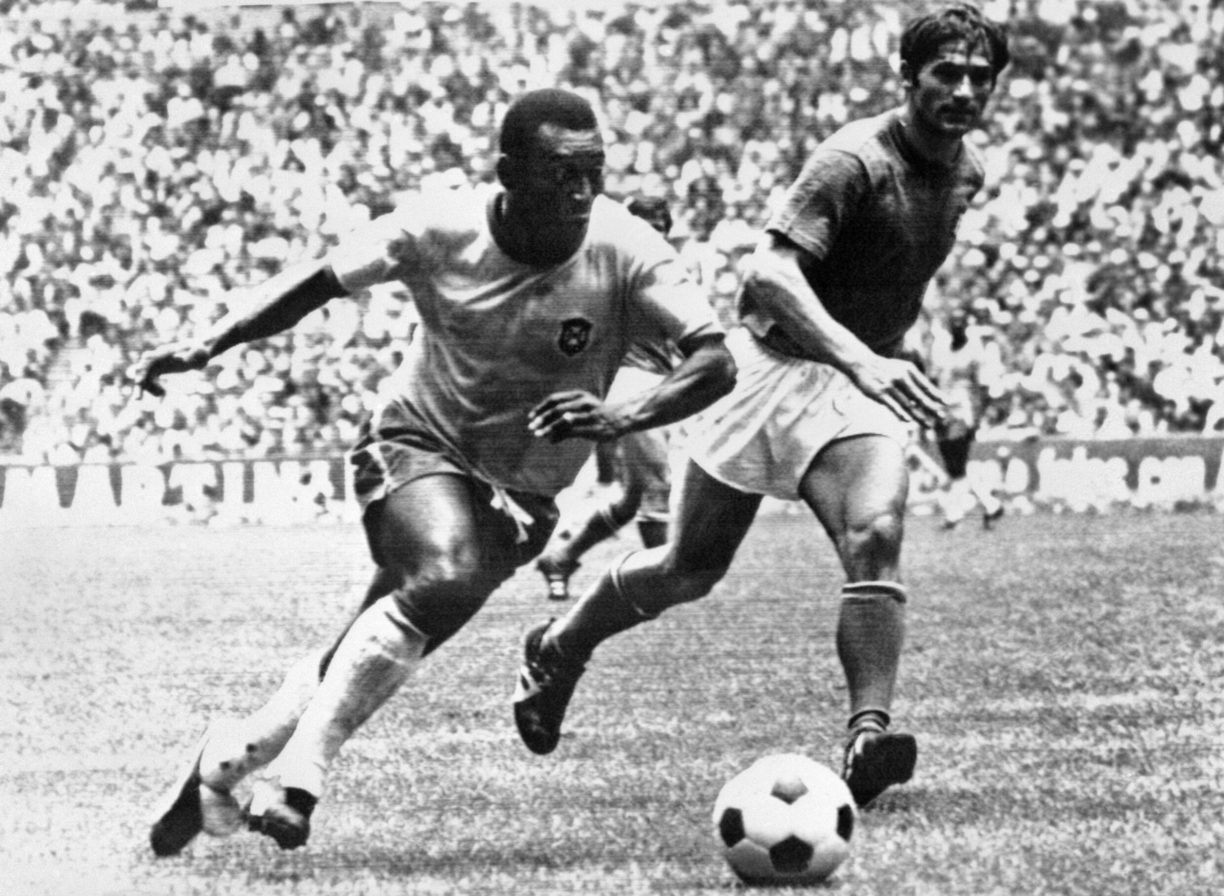 Pele (L) quickly disabused Tarcisio Burgnich (R) of him being just an ordinary human as the Italian defender found out after being told to mark him at the 1970 World Cup final which Brazil won 4-1