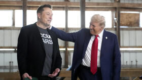 A file photo of Tesla and SpaceX CEO Elon Musk, left, and President Donald Trump attending a campaign event at the Butler Farm Show, October. 5, 2024, in Butler, Pennsylvania.