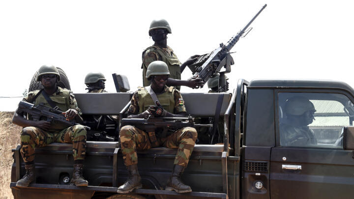 Togolese soldiers patrol in the country’s northern Tone prefecture, near the border with Burkina Faso, on February 17, 2020. Togo’s troops are deployed in the area to try and contain a spillover of jihadism towards coastal West Africa.