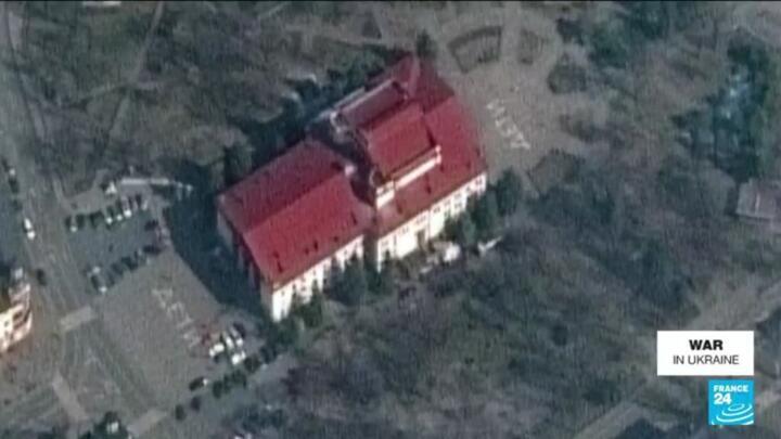 Shells hit theatre sheltering Ukraine civilians