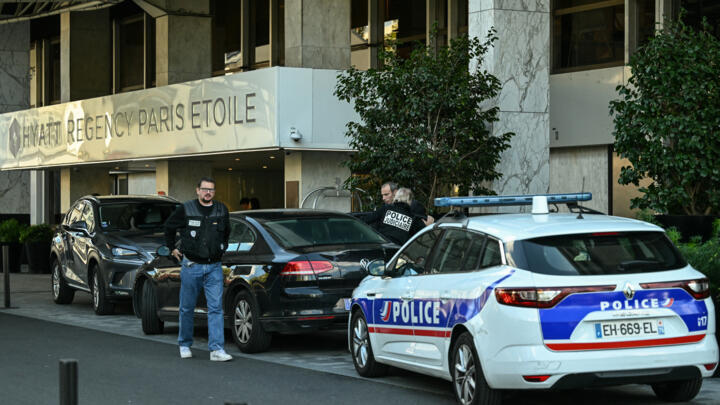 Investigators arrive at the Hyatt Regency Paris Étoile hotel at Porte Maillot in Paris after South Africa's ambassador to France was found dead at the foot of the building on September 30, 2025.