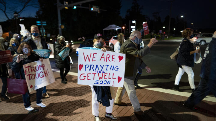 Supporters of President Donald Trump rally outside Walter Reed National Military Medical Center on October 3, 2020 in Bethesda, Maryland.