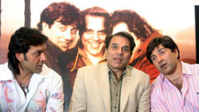 Dharmendra is flanked by his sons Bobby (left) and Sunny while promoting their film 'Apne' (My own)