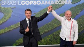 Brazil's President Luiz Inacio Lula da Silva (right) and his French counterpart Emmanuel Macron gave opening speeches at the COP30 leaders' summit in Belem, Brazil, on Nov. 6, 2025.