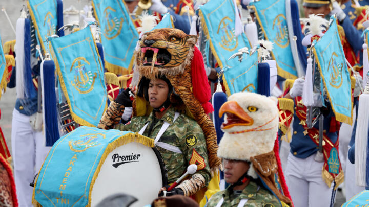 Indonesian army drumband Gabundan members parade during the annual Bastille Day military parade on the Champs-Elysees Avenue in Paris on July 14, 2025.