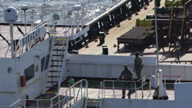 French soldiers on board a tanker linked to Russia's shadow fleet off the western French city of Saint-Nazaire on October 1, 2025.