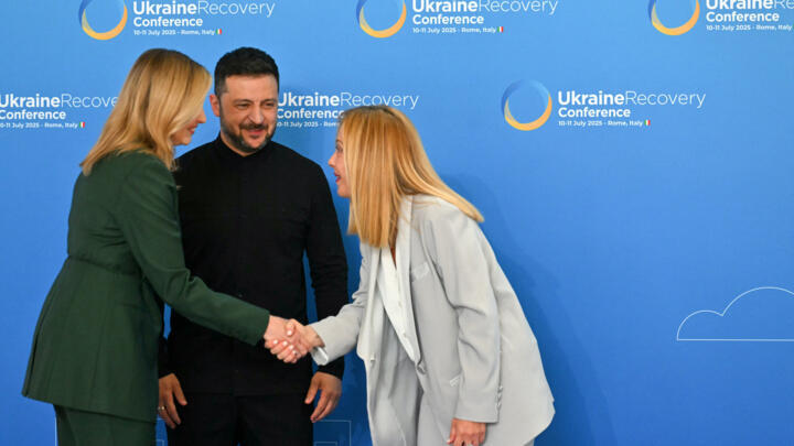 Italy's Prime Minister Giorgia Meloni welcomes Ukraine's President Volodymyr Zelensky and his wife Olena Zelenska to the Ukraine Recovery Conference in Rome on July 10, 2025.