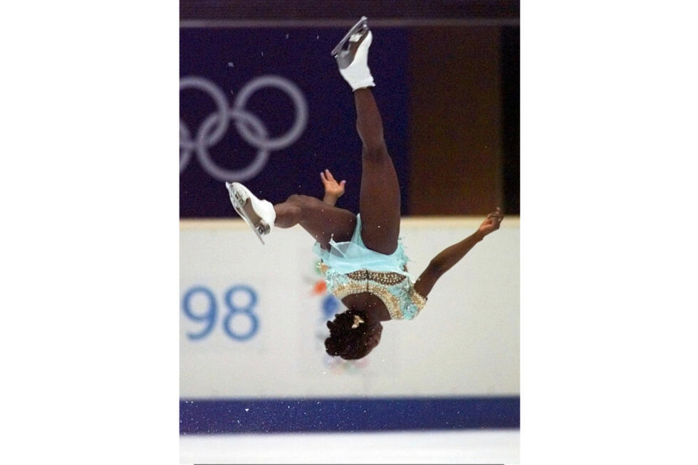France's Surya Bonaly performs a back flip during her free skate program at the Winter Olympics in Nagano, Japan, on February 20, 1998.