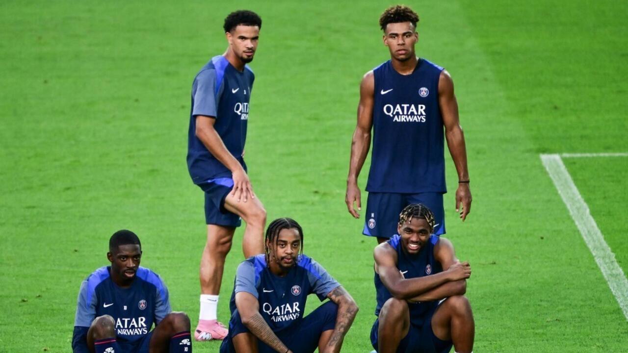 Paris Saint-Germain players take to the field on the eve of the 2025 UEFA Super Cup final football match between PSG and Tottenham Hotspur FC. 