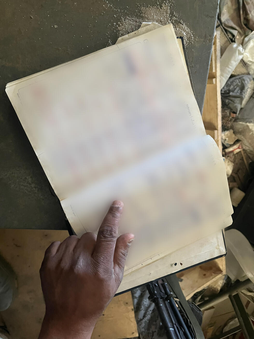 A 2012 diary with the names of men and women who passed through the Palestine Branch, Damascus, May 29, 2025.