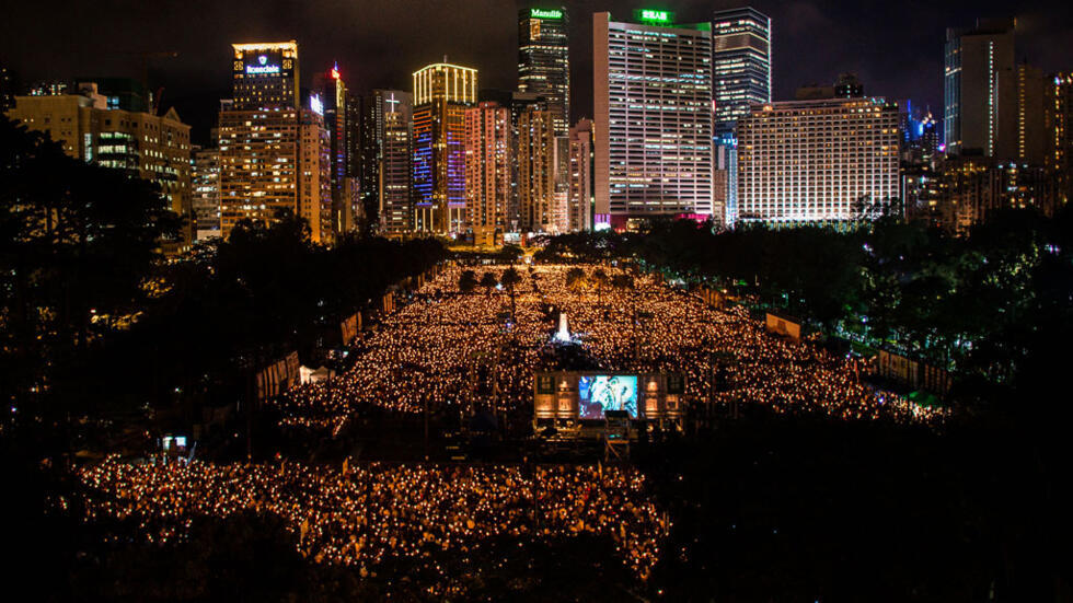 Thousands turn out for Tiananmen candelight vigil in Hong Kong