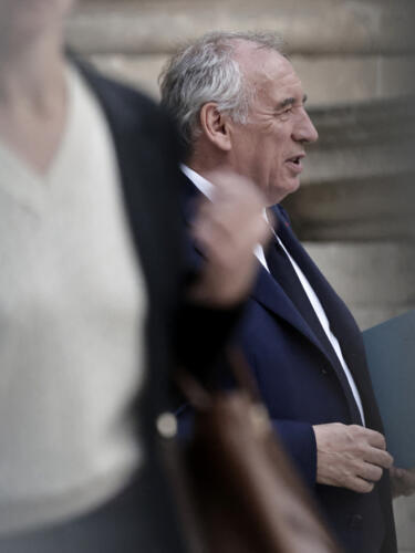 French PM Francois Bayrou leaves the National Assembly after the result of a confidence vote over the government's austerity budget, at the National Assembly in Paris on September 8, 2025.