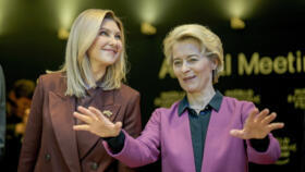 EU Commission President Ursula von der Leyen (right) attends a session at the World Economic Forum in Davos alongside Ukraine's First Lady Olena Zelenska on January 17, 2023..
