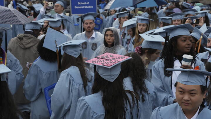 Students attend a commencement ceremony on Columbia University's main campus, in Manhattan, on Wednesday, May 21, 2025.