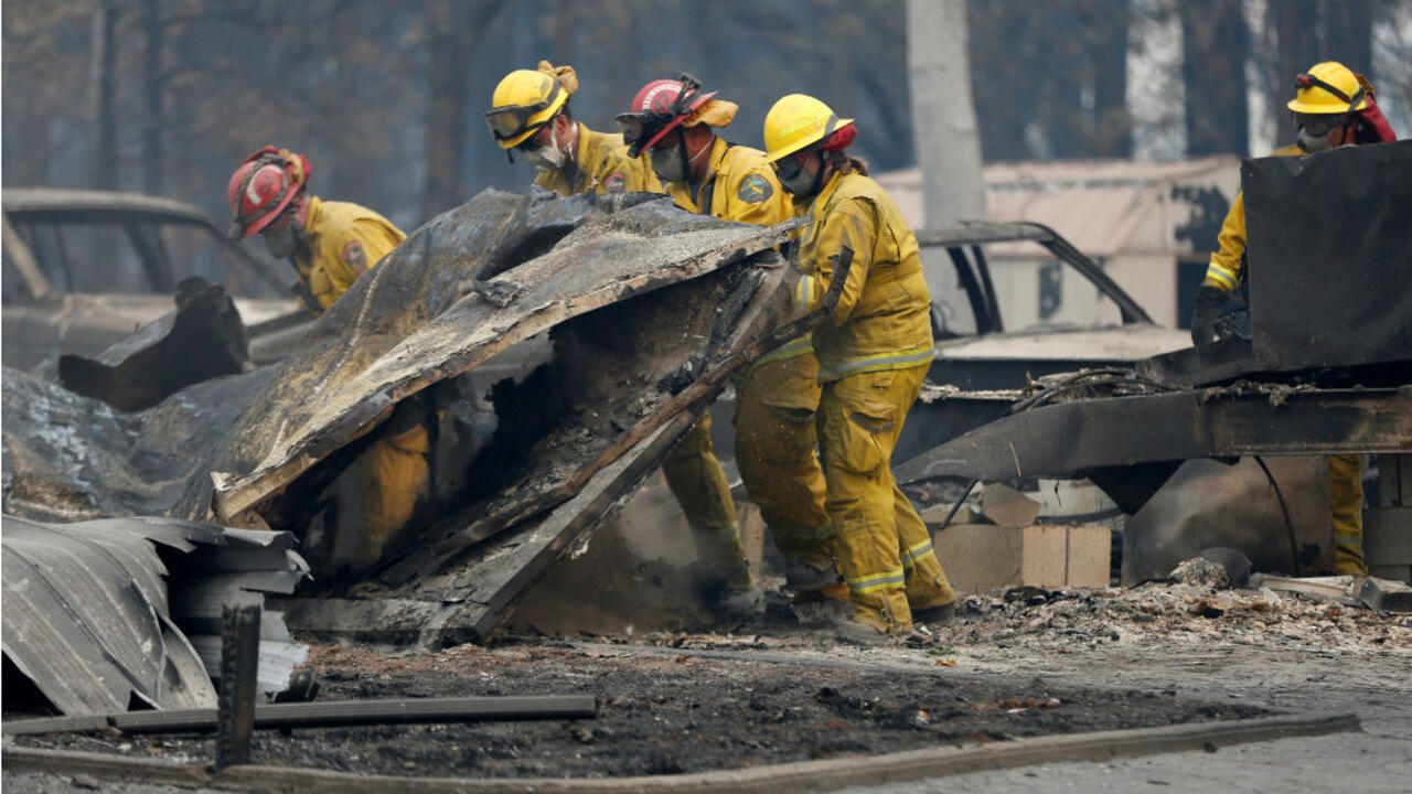 Trump visits California as wildfire death toll rises and more than