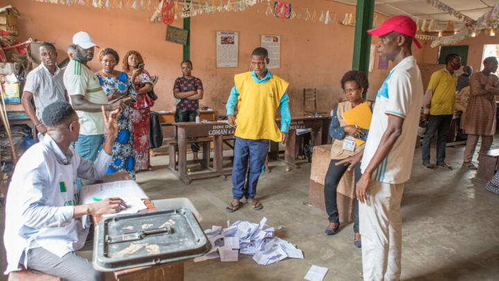 Election observers supervise the vote in Cotonou on January 8, 2023.