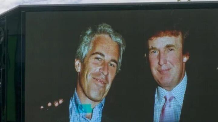 A photograph of US President Donald Trump and Jeffrey Epstein is displayed on the side of a van in Aberdeen city centre on July 28, 2025.