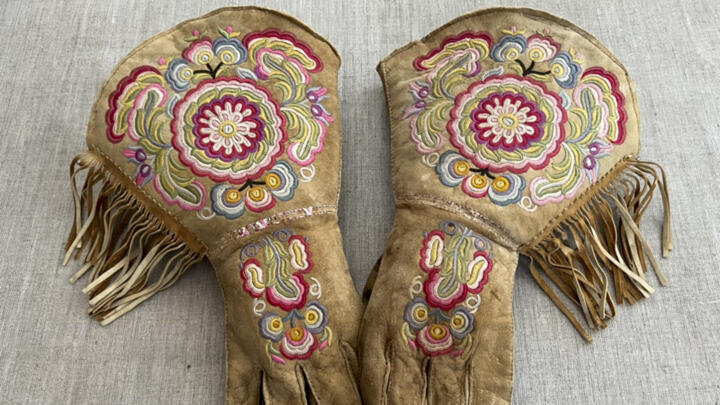 A pair of gauntlets made in the late 19th-century Cree-Metif native Canadian traditional style by indigenous activist Gregory Scofield.
