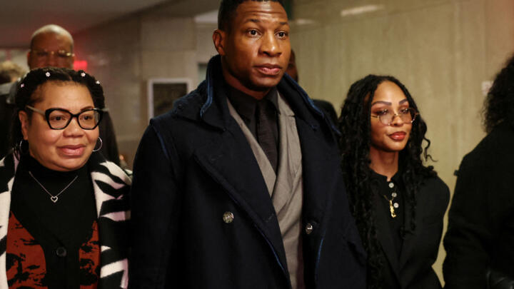 Actor Jonathan Majors arrives with Meagan Good for the jury selection in his  assault and harassment case at Manhattan Criminal Court in New York City, US,  December 18, 2023.