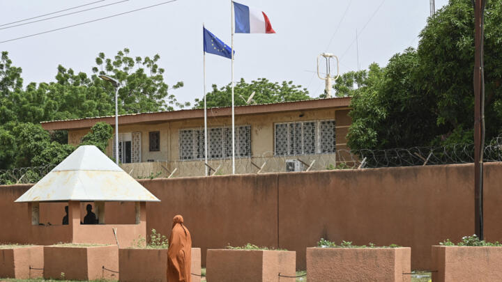 File photo: A woman walks past the French Embassy building in Niamey, Niger on September 7, 2023.