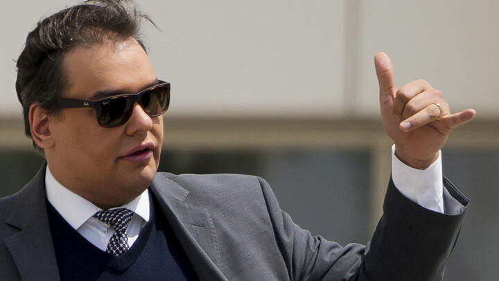 File photo of former US Congressman George Santos leaving court after his sentencing taken April 25, 2025, in Central Islip, NY. 