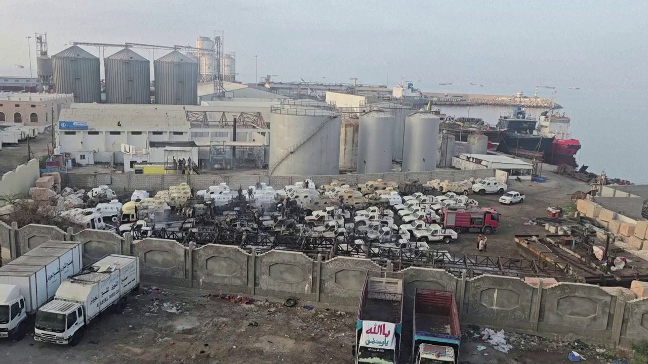 Video footage from AFP confirms the location of damage at the port of Mukalla, southern Yemen. Firefighters are seen tackling a fire that seems to have gutted multiple military vehicles.