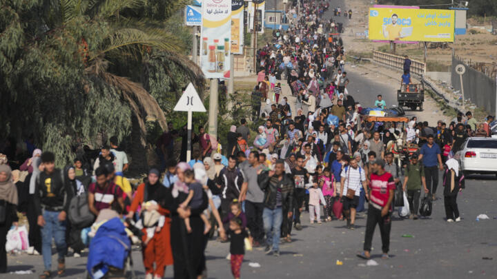 Palestinians flee to the southern Gaza Strip on Salah al-Din Street in Bureij, Gaza Strip, on November 8, 2023.