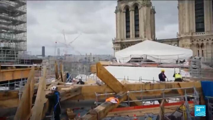 President Macron awards actors of rebuilding of Notre Dame after 2019 fire