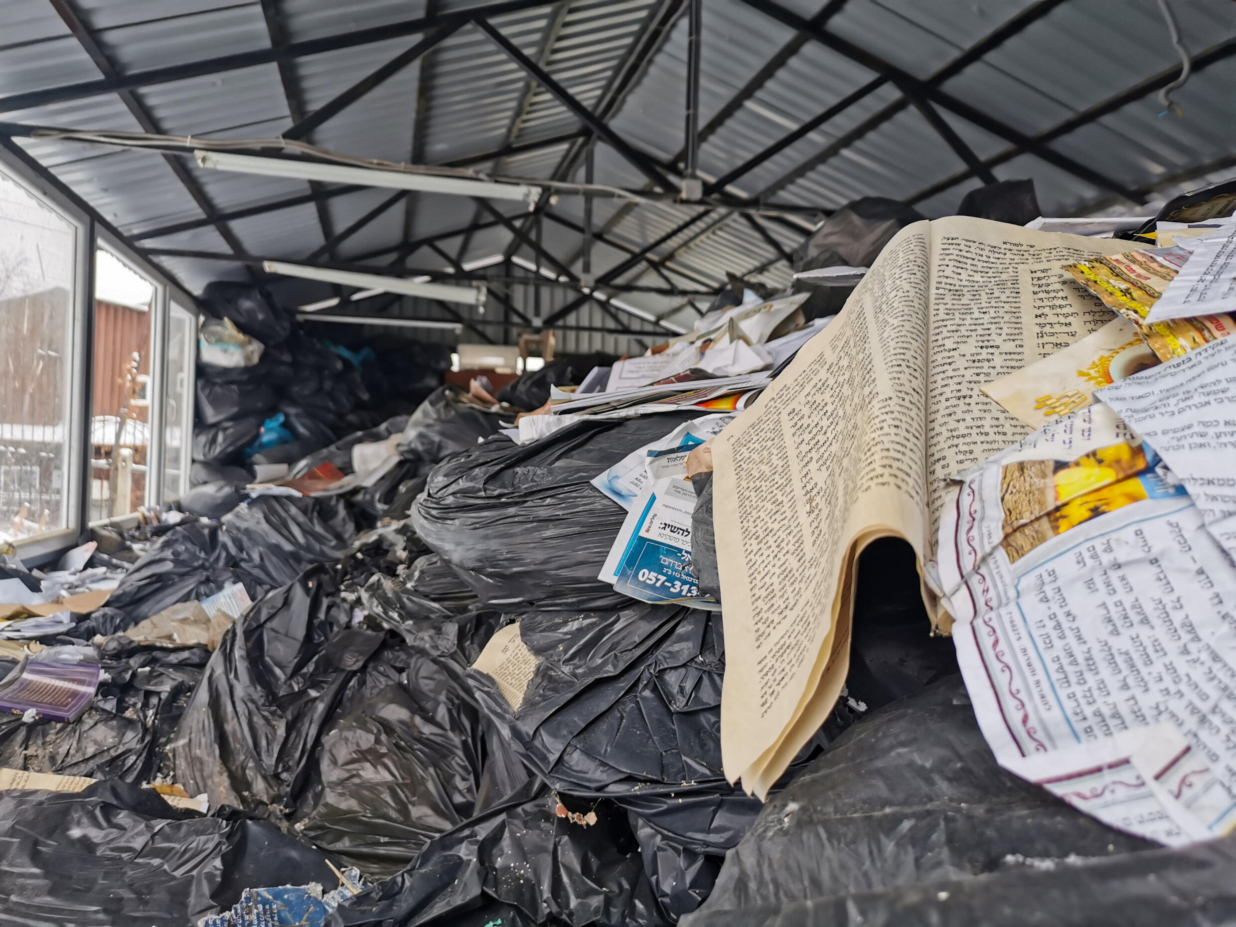 The community's sacred books must be preserved for religious reasons