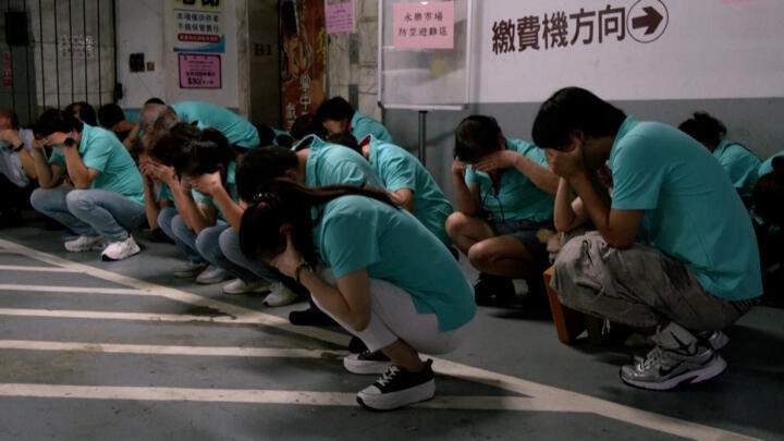 People take shelter as part of civil defence drills in Taipei, Taiwan, on July 23, 2024.