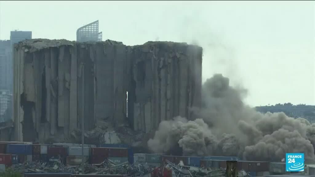 Port silos crack and fall near Beirut waterfront as protesters mark two years since deadly blast