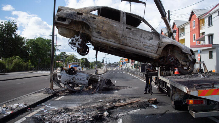 Torched vehicles in Fort-de-France, on the French Caribbean island of Martinique.