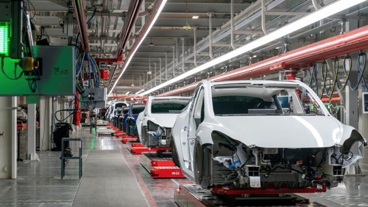 Cars are seen on the assembly line during a tour of the Tesla Giga Texas manufacturing facility ahead of the "Cyber Rodeo" grand opening party on April 7, 2022 in Austin, Texas.