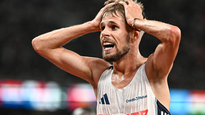 France's Jimmy Gressier reacts after winning the world 10,000m.