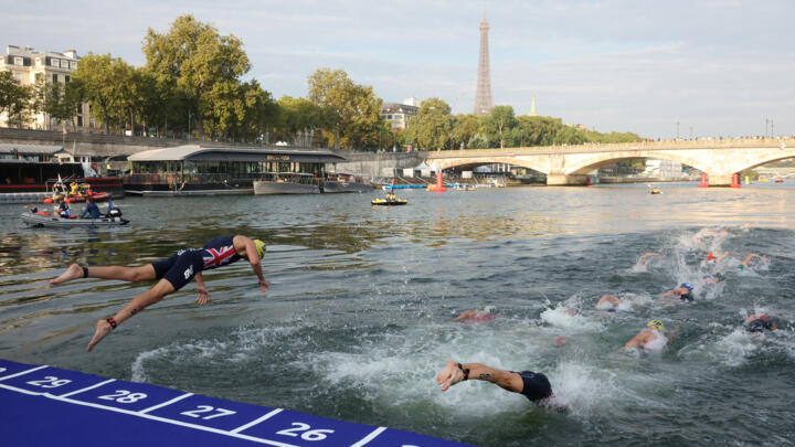 File photo of athletes competing in the elite men triathlon test event in the river seine on August 18, 2023.