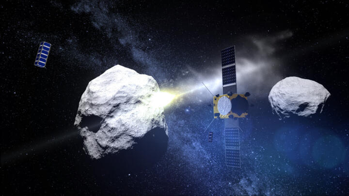 This synthetic image released by the European Space Agency on May 15, 2015 shows the impact of the DART probe on the Didymos asteroid system.
