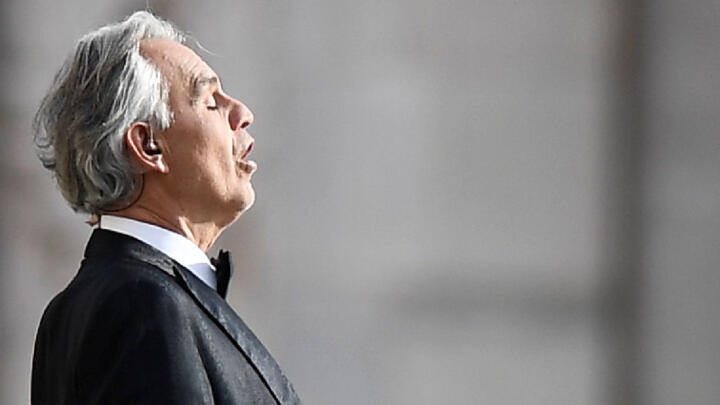 Italian opera singer Andrea Bocelli rehearses in front of Milan's Duomo Cathedral ahead of giving a streamed live performance intended as a symbol of love, hope and healing amidst the coronavirus disease (COVID-19) pandemic, on Easter Sunday, in Milan, Italy, April 12, 2020.
