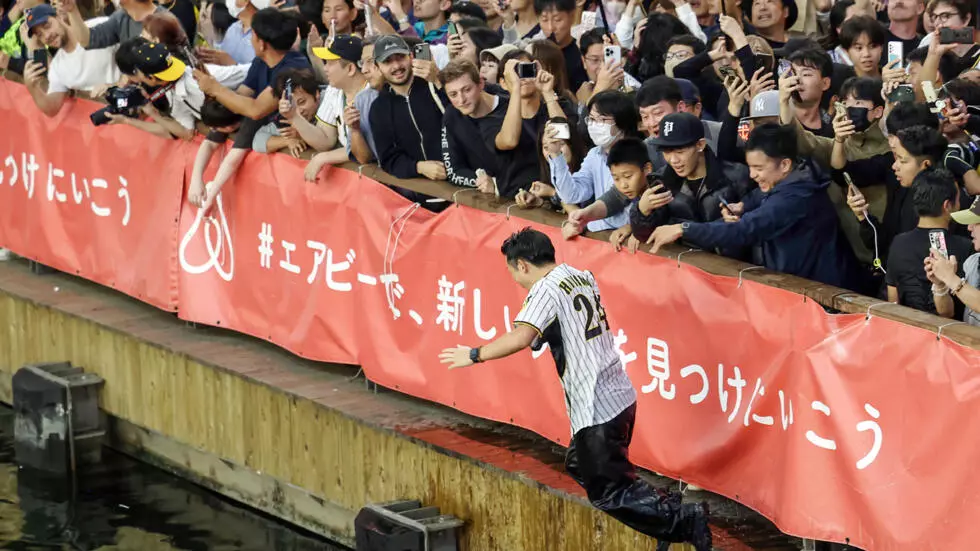 Japanese baseball fans jump into river as 'Curse …