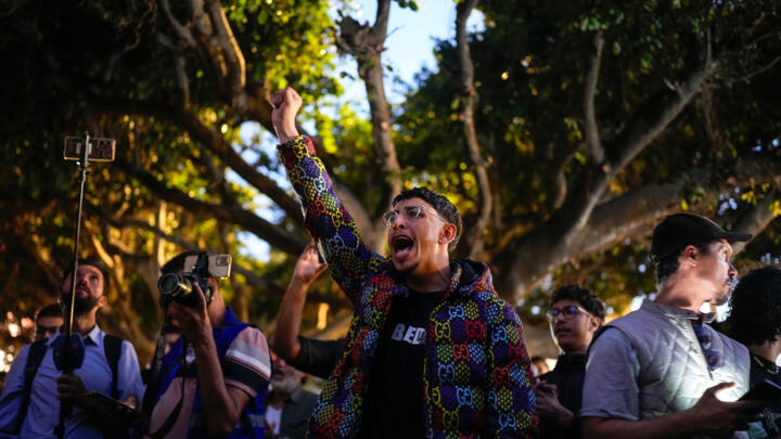 People take part in a youth-led protest against corruption and calling for healthcare and education reform, in Rabat, Morocco.