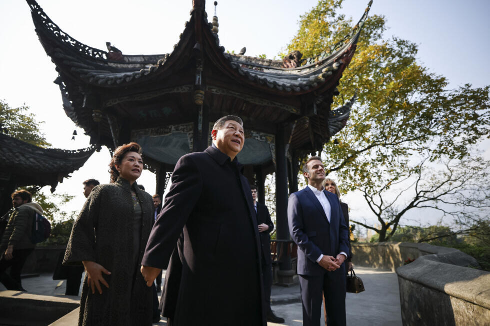 French President Emmanuel Macron, his wife Brigitte Macron, Chinese President Xi Jinping and his wife Peng Liyuan visit the UNESCO World Heritage Site of Dujiangyan in Sichuan Province.