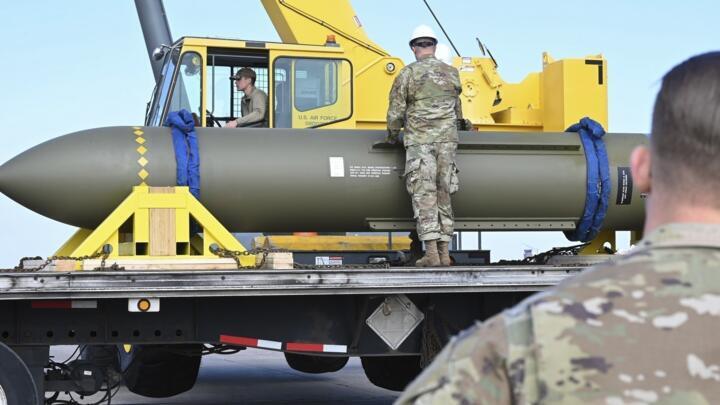 Airmen look at a GBU-57, or the Massive Ordnance Penetrator bomb, at Whiteman Air Base in Missouri, in this photo released by the US Air Force on May 2, 2023. 