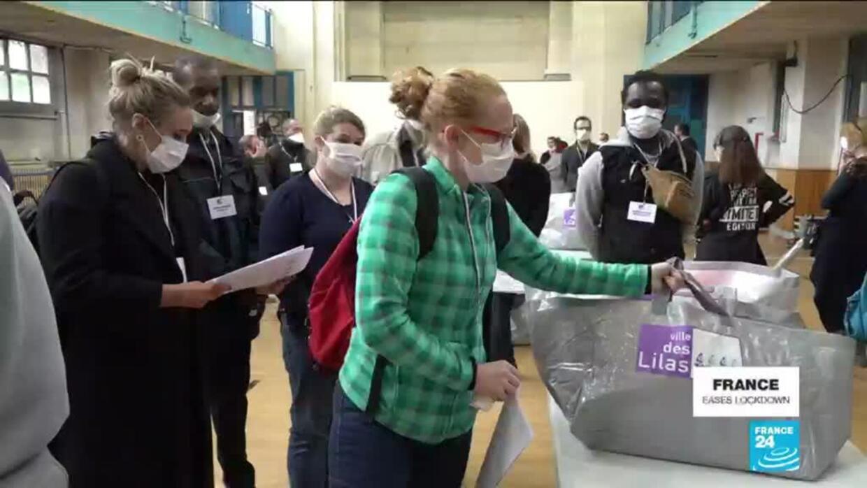 Paris suburb distributes free masks as France eases lockdown measures - France 24